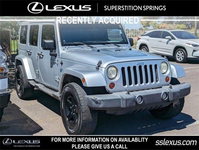 used 2012 Jeep Wrangler Unlimited car, priced at $17,599