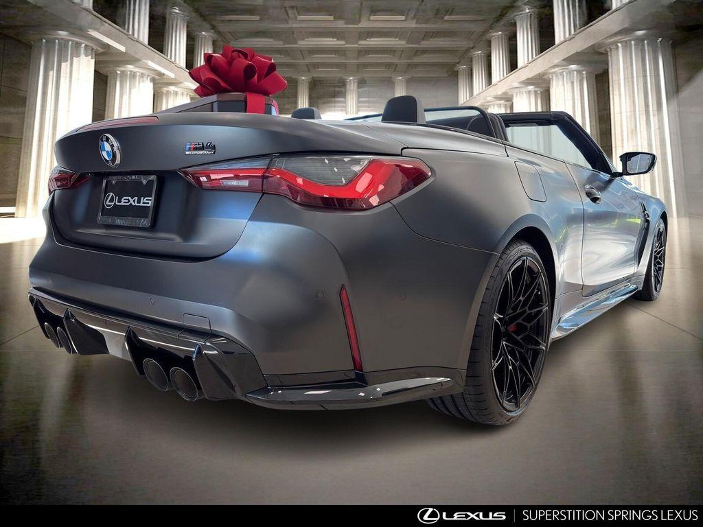 used 2022 BMW M4 car, priced at $70,476