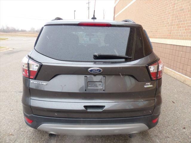 used 2018 Ford Escape car, priced at $11,995