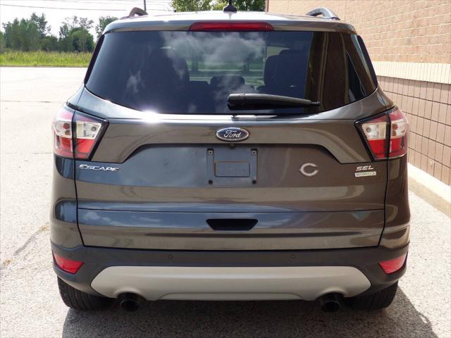 used 2018 Ford Escape car, priced at $13,995