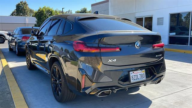 used 2022 BMW X4 car, priced at $35,400