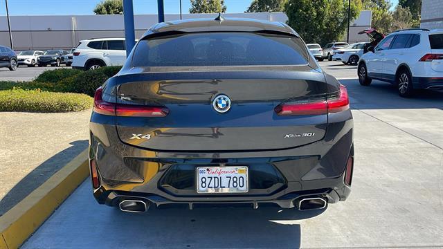used 2022 BMW X4 car, priced at $35,400