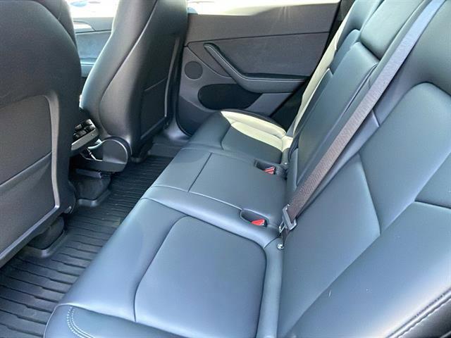 used 2024 Tesla Model Y car, priced at $32,558