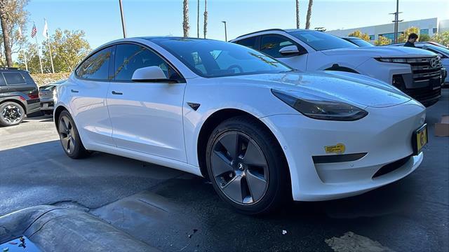 used 2021 Tesla Model 3 car, priced at $17,000