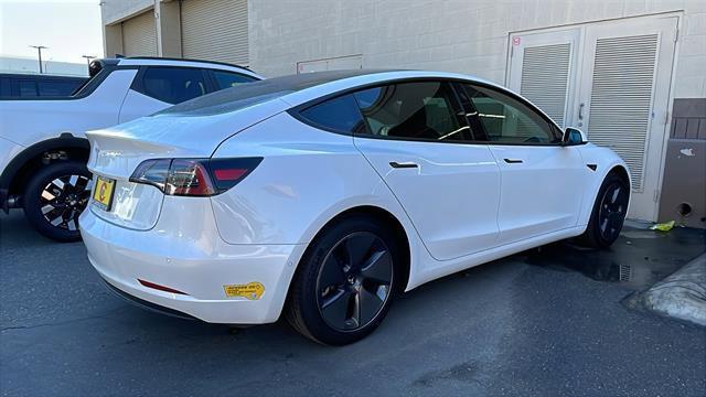 used 2021 Tesla Model 3 car, priced at $17,000