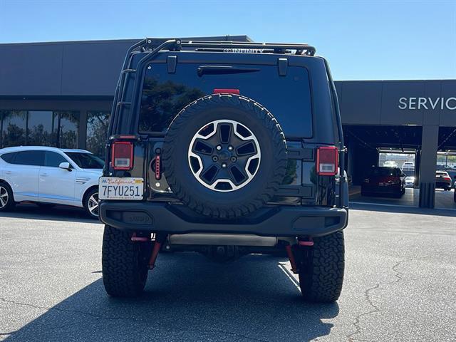 used 2014 Jeep Wrangler Unlimited car, priced at $20,239