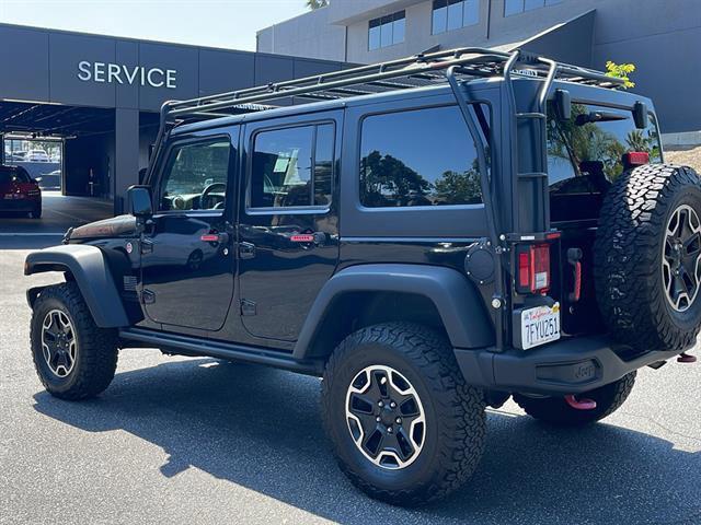 used 2014 Jeep Wrangler Unlimited car, priced at $20,239