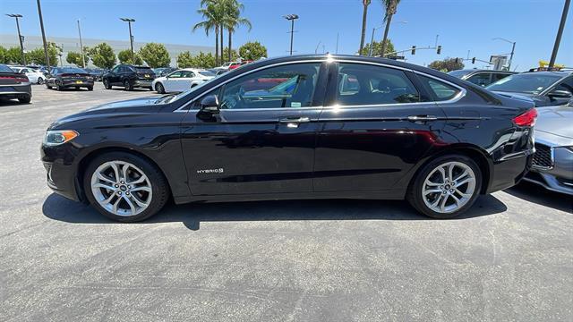 used 2019 Ford Fusion Hybrid car, priced at $15,000