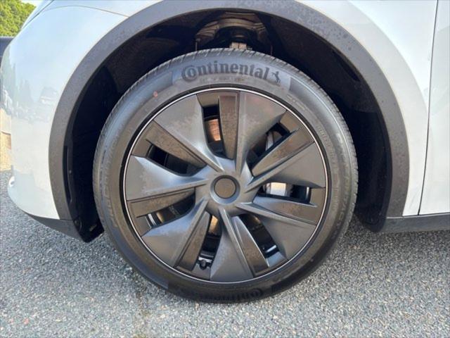 used 2024 Tesla Model Y car, priced at $36,995