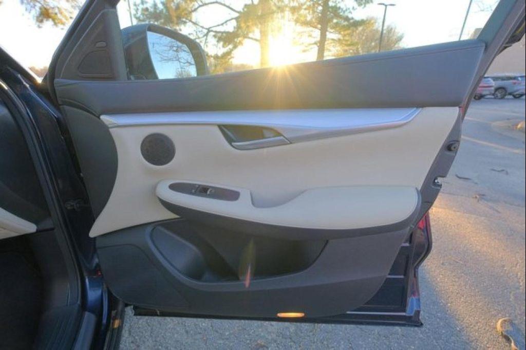 used 2021 INFINITI QX50 car, priced at $29,995