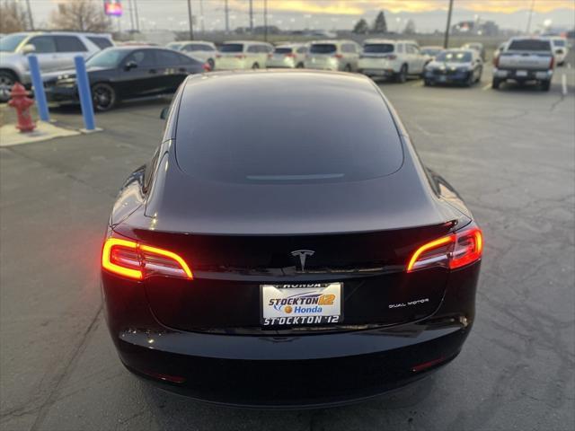 used 2022 Tesla Model 3 car, priced at $28,360