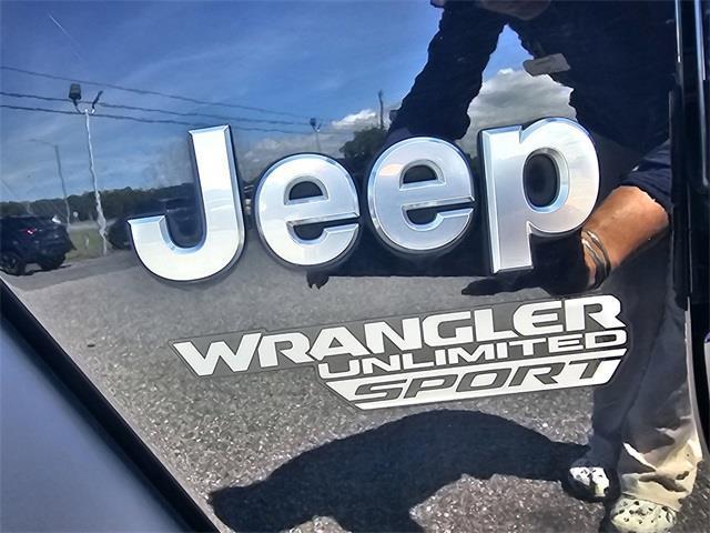 used 2021 Jeep Wrangler Unlimited car, priced at $31,936