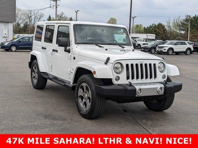 used 2018 Jeep Wrangler JK Unlimited car, priced at $29,495