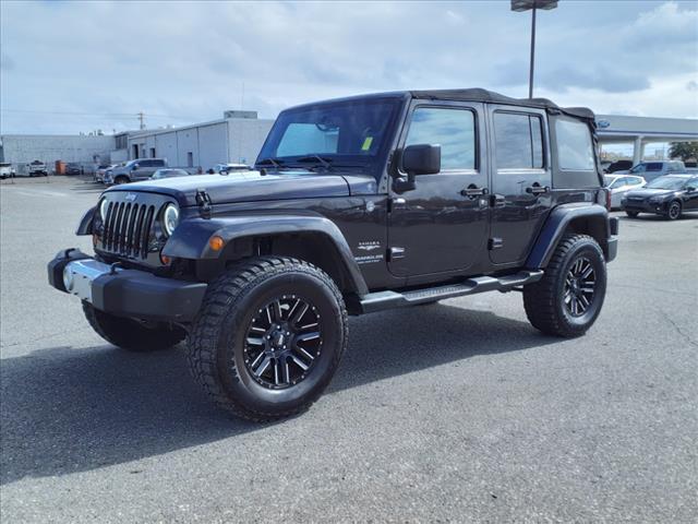 used 2013 Jeep Wrangler Unlimited car, priced at $16,999