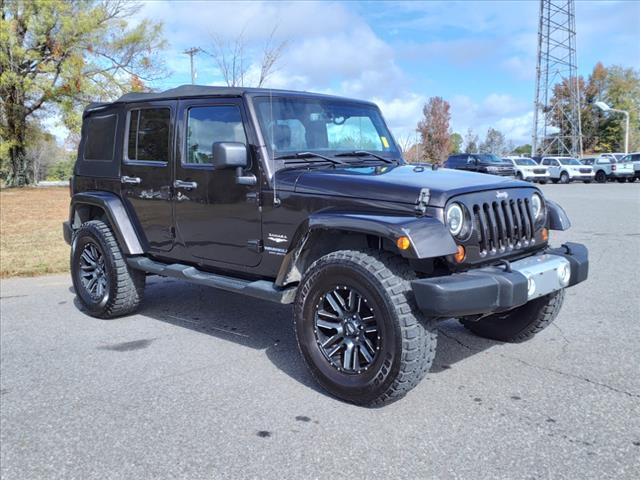 used 2013 Jeep Wrangler Unlimited car, priced at $16,599