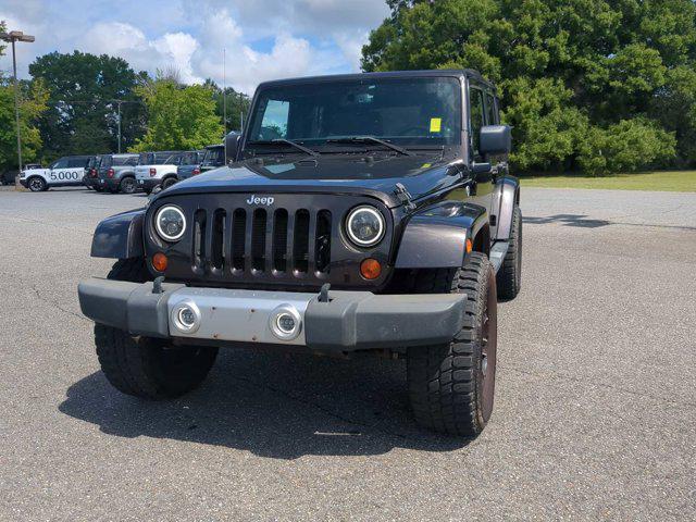 used 2013 Jeep Wrangler Unlimited car, priced at $17,605