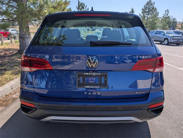 used 2023 Volkswagen Taos car, priced at $22,900