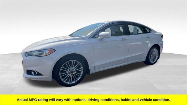 used 2014 Ford Fusion car, priced at $12,900