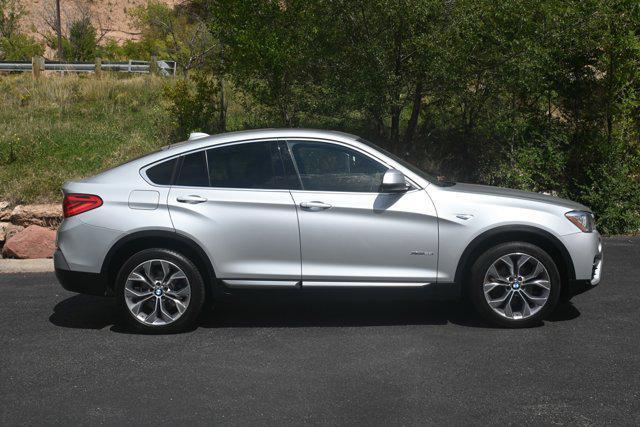 used 2018 BMW X4 car, priced at $14,098