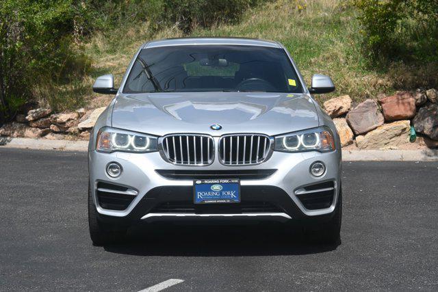 used 2018 BMW X4 car, priced at $14,098