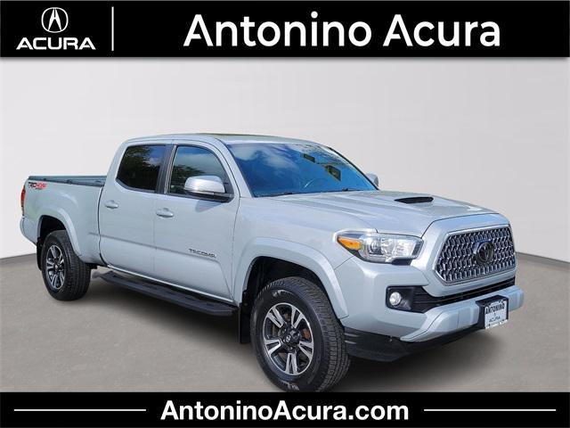 used 2018 Toyota Tacoma car, priced at $27,385