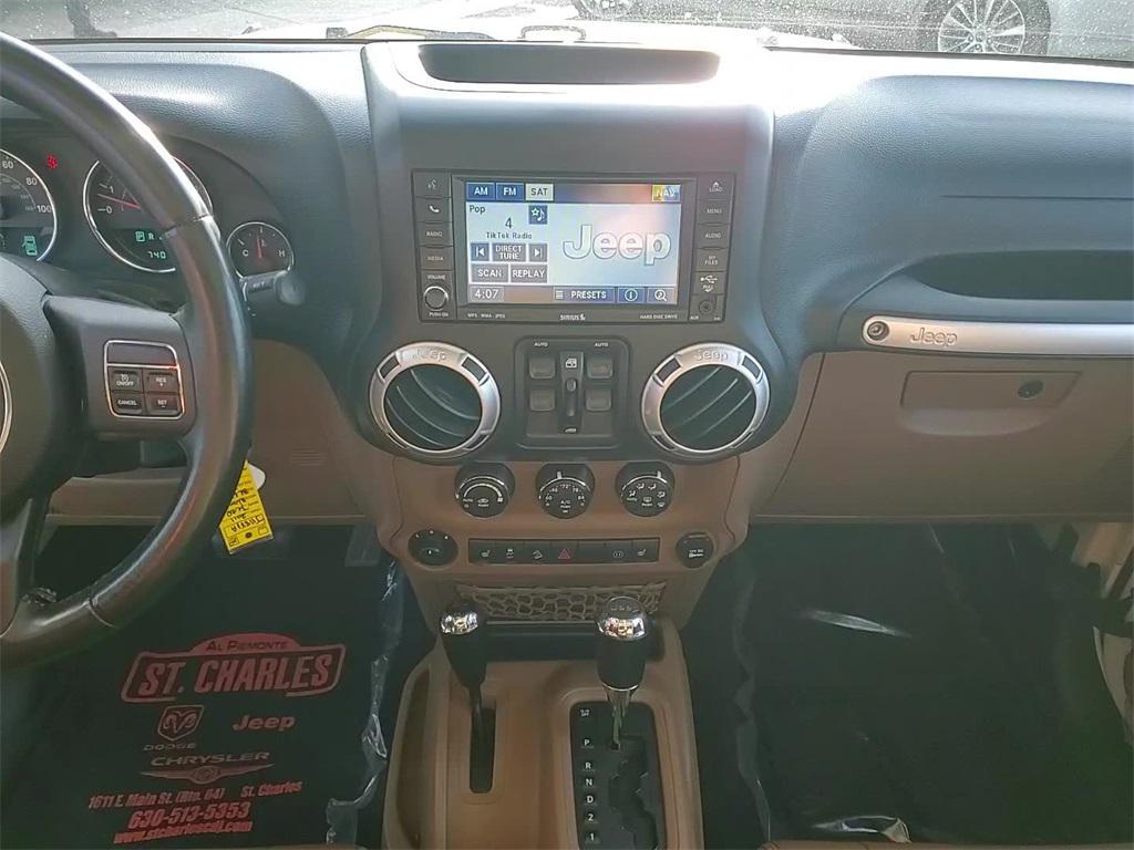 used 2011 Jeep Wrangler Unlimited car, priced at $16,500