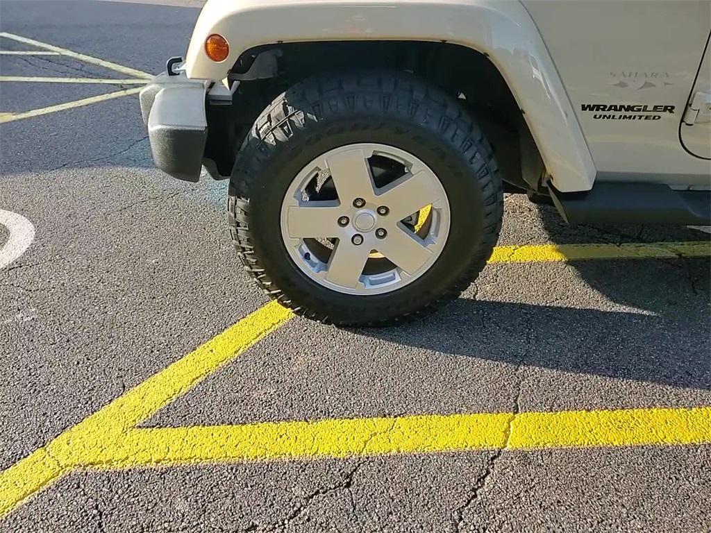 used 2011 Jeep Wrangler Unlimited car, priced at $16,500