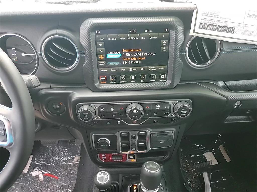 used 2023 Jeep Wrangler 4xe car, priced at $59,555