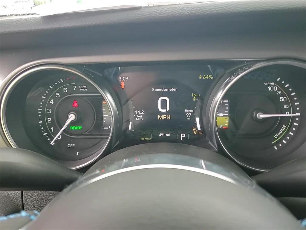 used 2023 Jeep Wrangler 4xe car, priced at $52,135