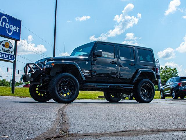 used 2011 Jeep Wrangler Unlimited car, priced at $13,485