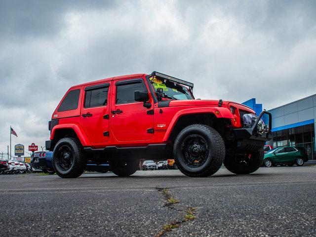 used 2013 Jeep Wrangler Unlimited car, priced at $17,601