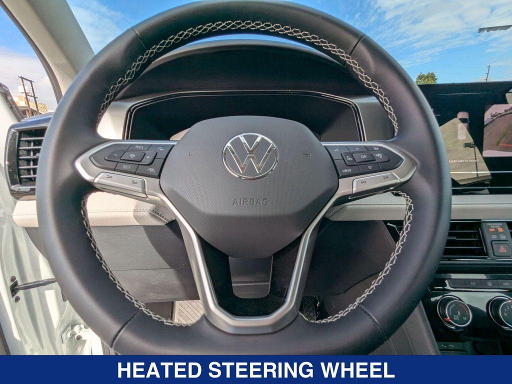 new 2025 Volkswagen Taos car, priced at $27,521