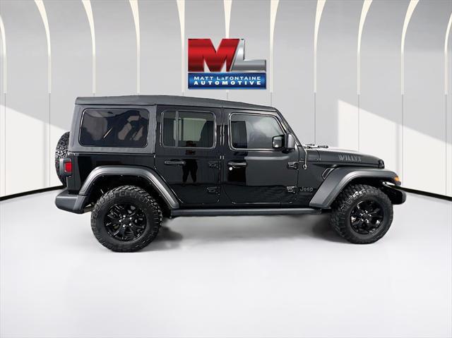 used 2021 Jeep Wrangler Unlimited car, priced at $30,734