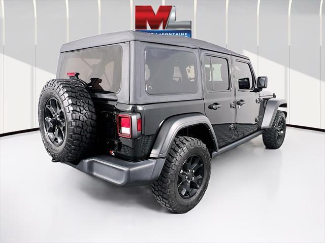 used 2021 Jeep Wrangler Unlimited car, priced at $30,734