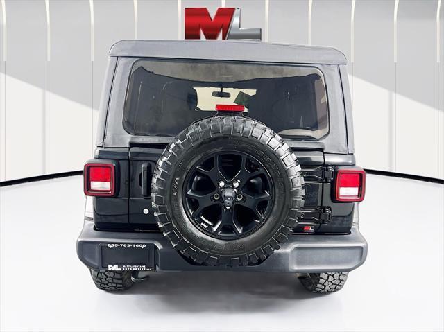 used 2021 Jeep Wrangler Unlimited car, priced at $30,734