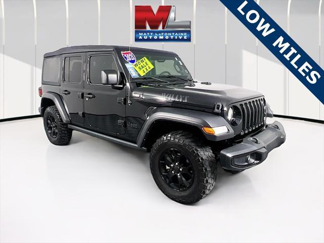 used 2021 Jeep Wrangler Unlimited car, priced at $31,899