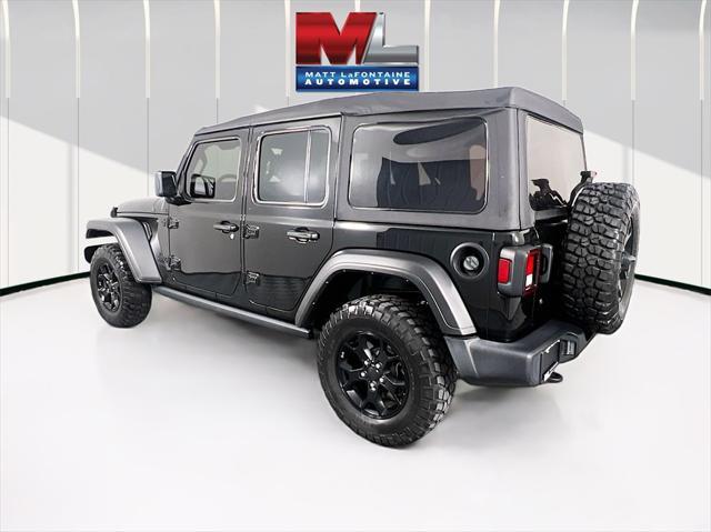 used 2021 Jeep Wrangler Unlimited car, priced at $30,734