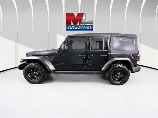 used 2021 Jeep Wrangler Unlimited car, priced at $30,734