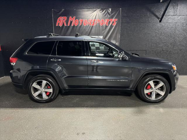 used 2014 Jeep Grand Cherokee car, priced at $15,975