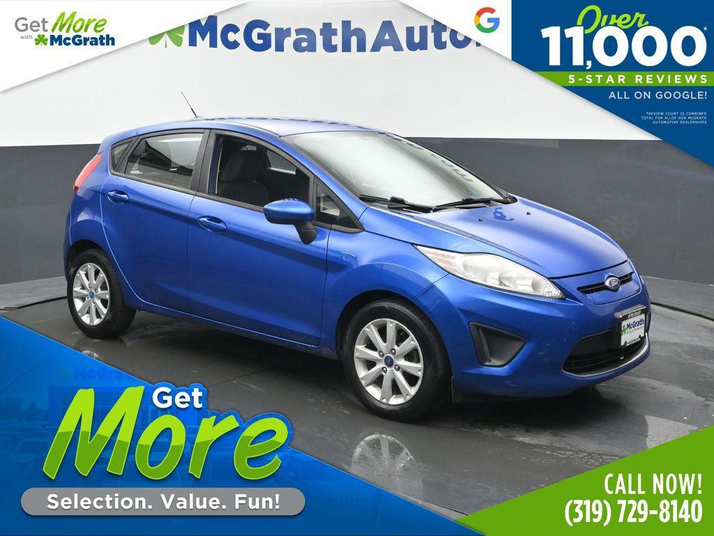 used 2011 Ford Fiesta car, priced at $6,000