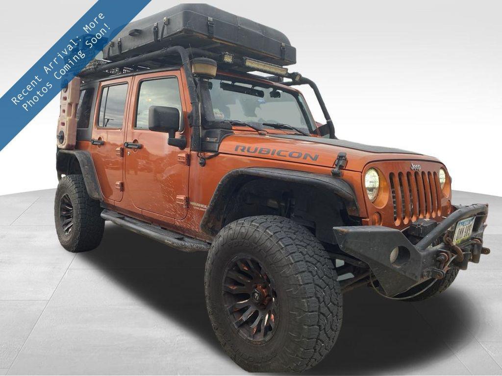 used 2011 Jeep Wrangler Unlimited car, priced at $13,000