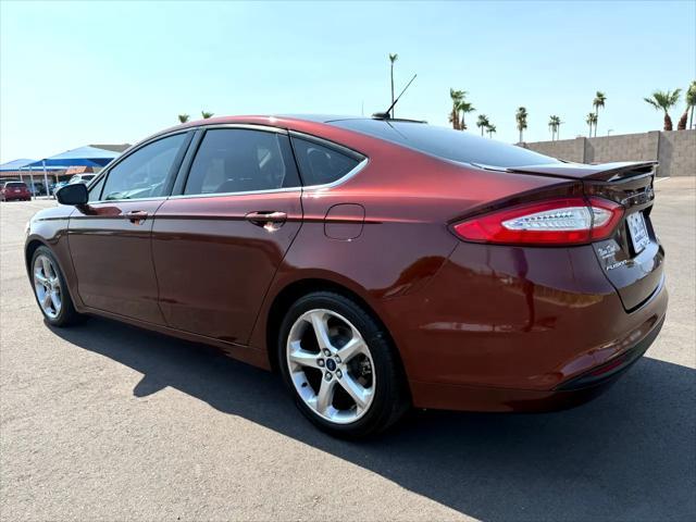used 2016 Ford Fusion car, priced at $7,988
