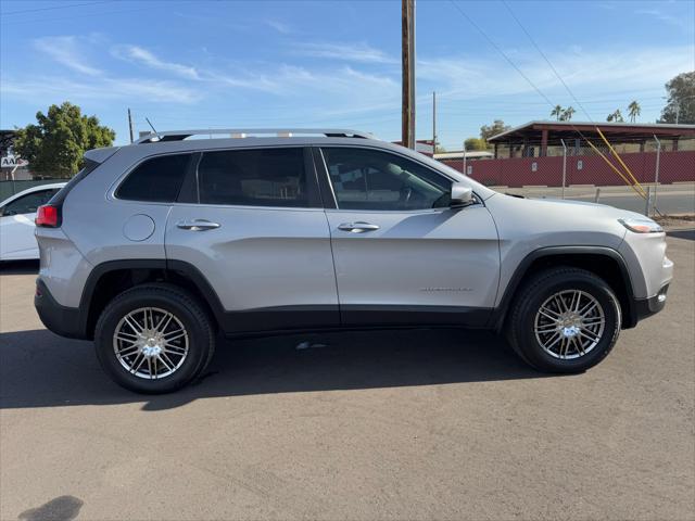 used 2014 Jeep Cherokee car, priced at $9,988