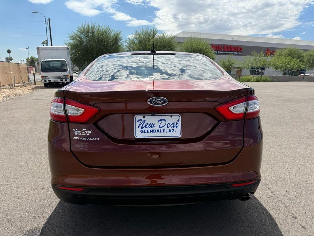 used 2016 Ford Fusion car, priced at $7,988