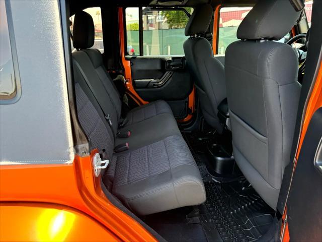 used 2011 Jeep Wrangler Unlimited car, priced at $14,988