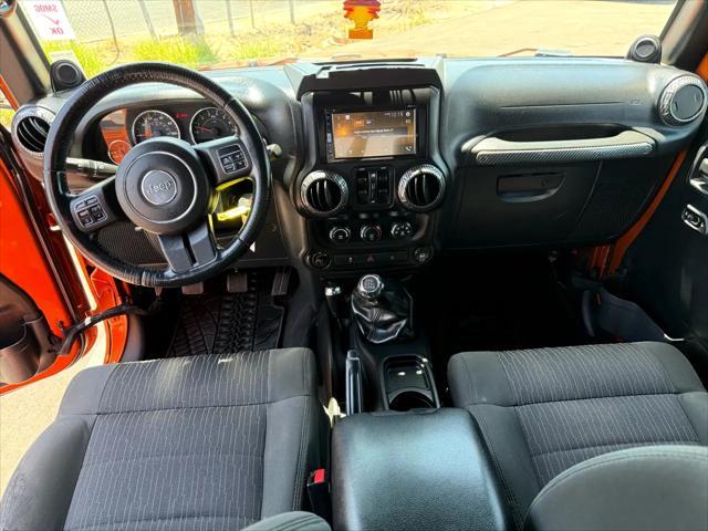 used 2011 Jeep Wrangler Unlimited car, priced at $14,988
