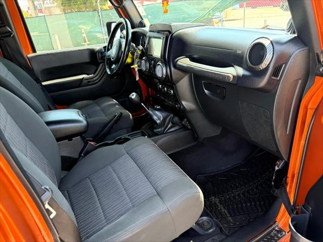used 2011 Jeep Wrangler Unlimited car, priced at $14,988