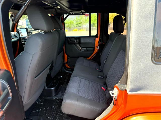 used 2011 Jeep Wrangler Unlimited car, priced at $14,988