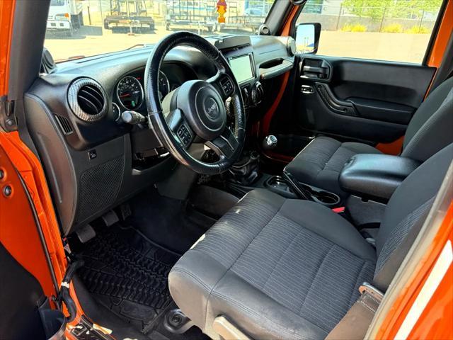 used 2011 Jeep Wrangler Unlimited car, priced at $14,988