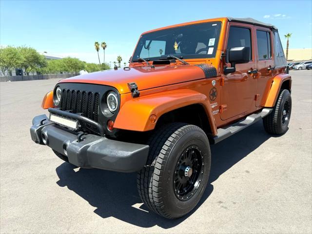 used 2011 Jeep Wrangler Unlimited car, priced at $14,988